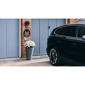 Ohme Home Pro 7.4kW EV Charger installed on brick/garage