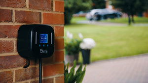 Ohme Home Pro 7.4kW EV Charger installed on brick close-up